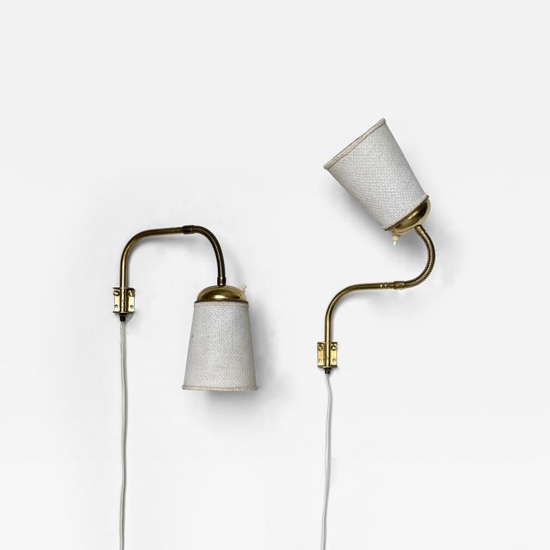  Asea Attributed to ASEA pair of adjustable wall lamps 1950s
