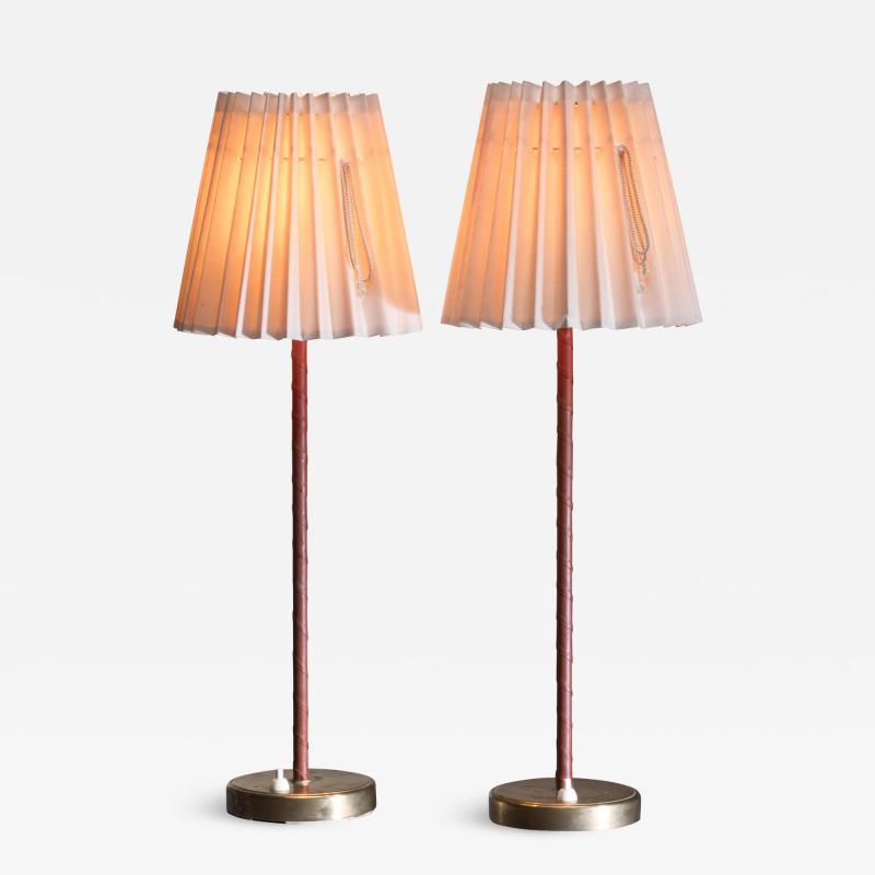  Asea Pair of ASEA brass and leather table lamps