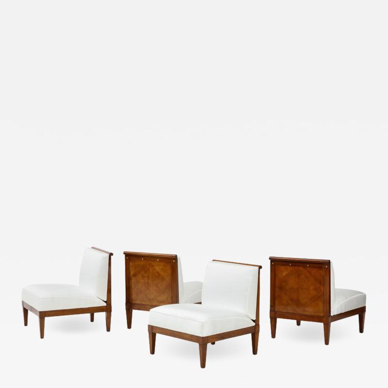  Baker Furniture Company Set of four mid century modern walnut lounge chairs by Baker Furniture