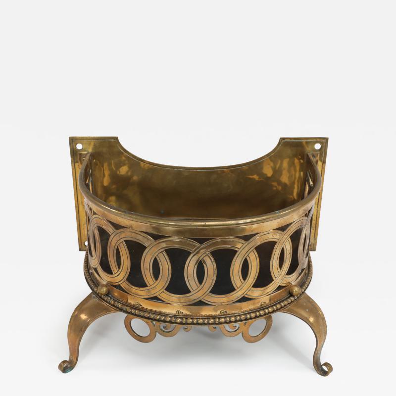  Birmingham Guild of Handicraft Birmingham Guild of Handicraft attributed A gilded semi circular brass planter 