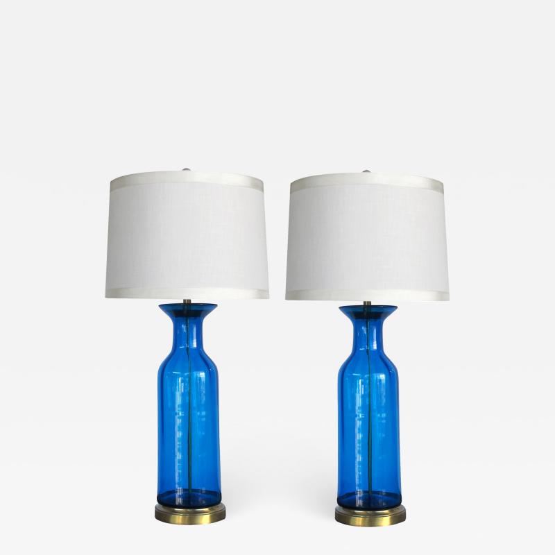  Blenko Glass Co Striking pair of blue art glass bottle form lamps possibly by Blenko Glassworks