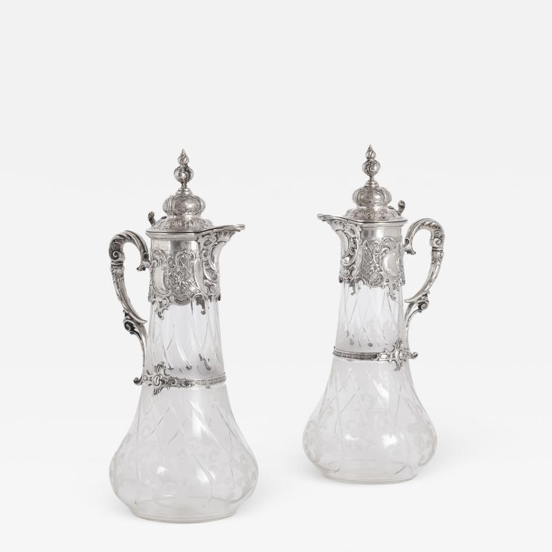  Bruckmann Sohne Pair of etched glass and silver pitchers by Bruckmann Sohne