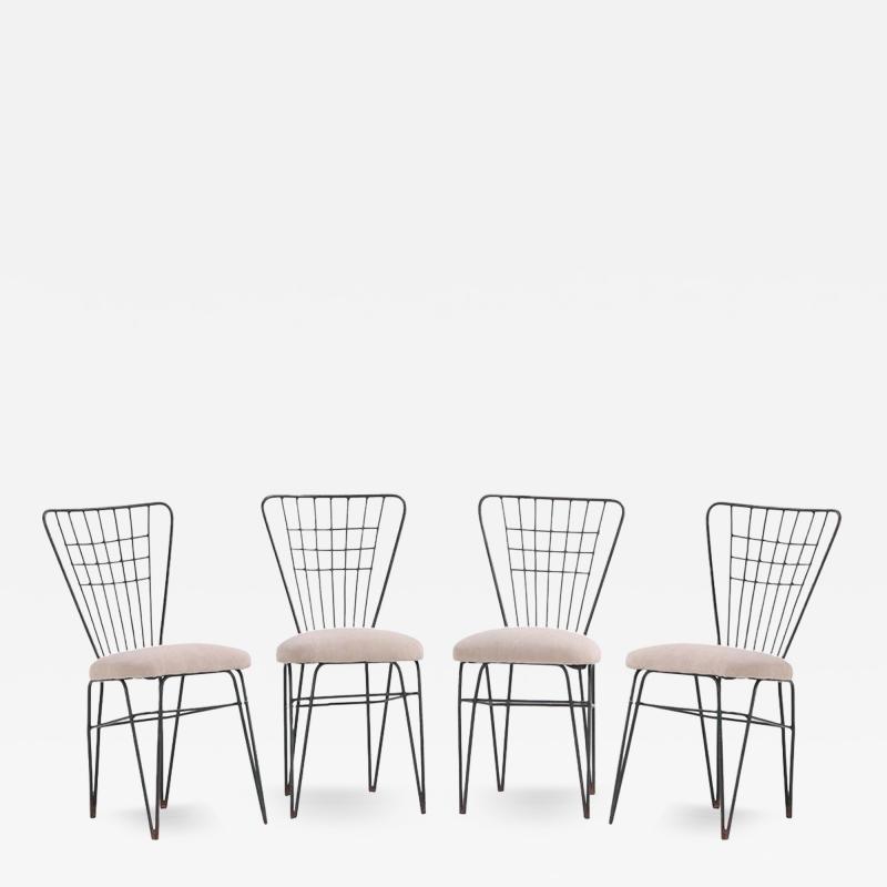  COMTE A set of four iron and bronze side chairs attributed to Comte C 1950 