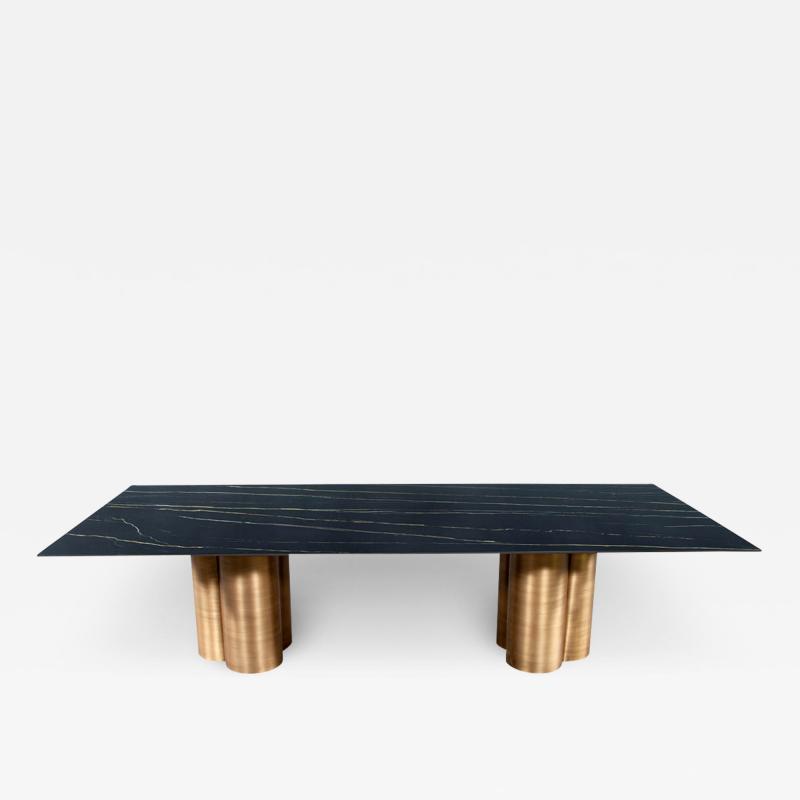  Carrocel Interiors Custom Modern Porcelain Dining Table with Antiqued Brass Clover Pedestals