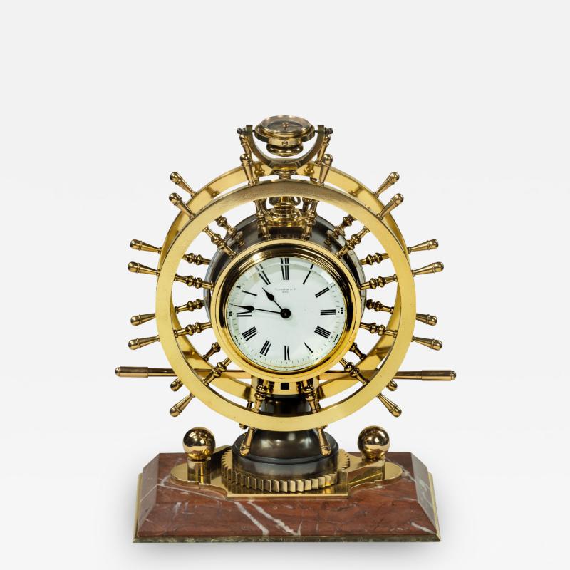  Elkington Co A Victorian brass novelty clock by Elkington Co