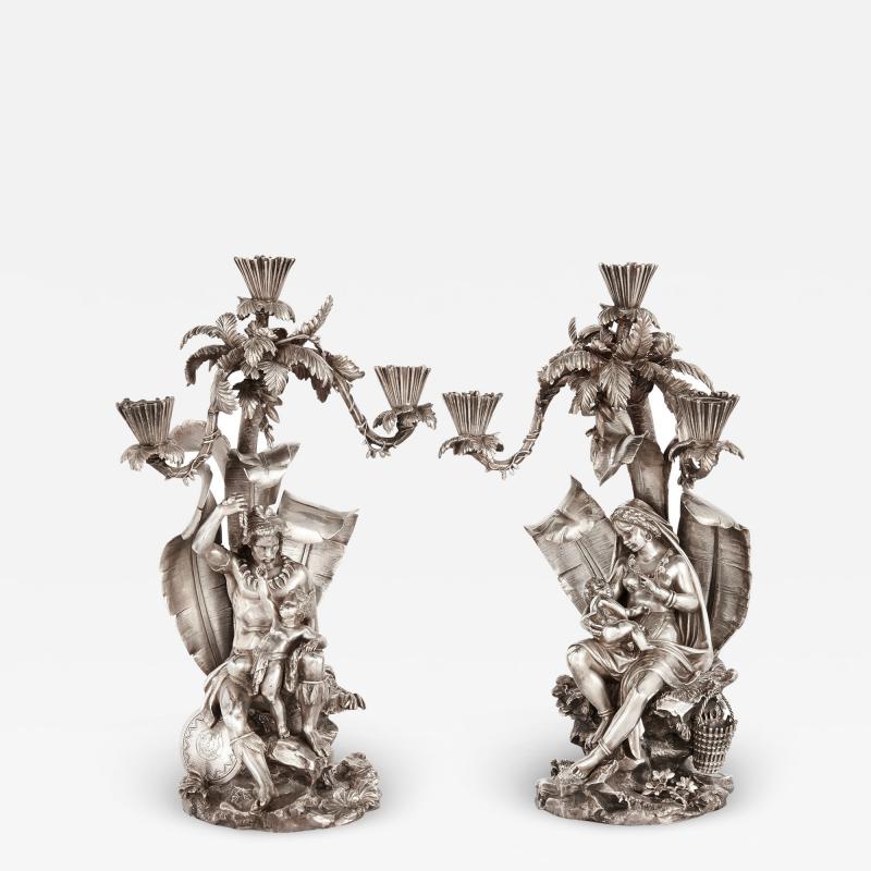  Elkington Co Pair of figural candelabra by Elkington Mason Co