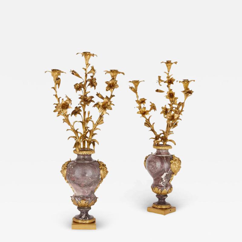  Eug ne Bazart Pair of large Rococo style gilt bronze and marble candelabra