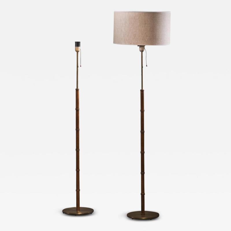  Falkenbergs Belysning Pair of oak and brass floor lamps