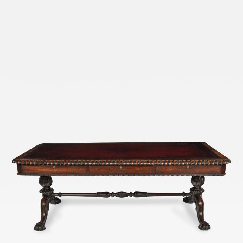  Gillows of Lancaster London A Regency rosewood six drawer library table by Gillows