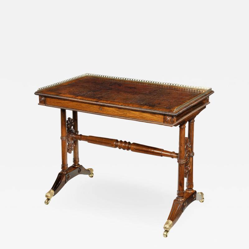  Gillows of Lancaster London A William IV rosewood free standing end support table attributed to Gillows