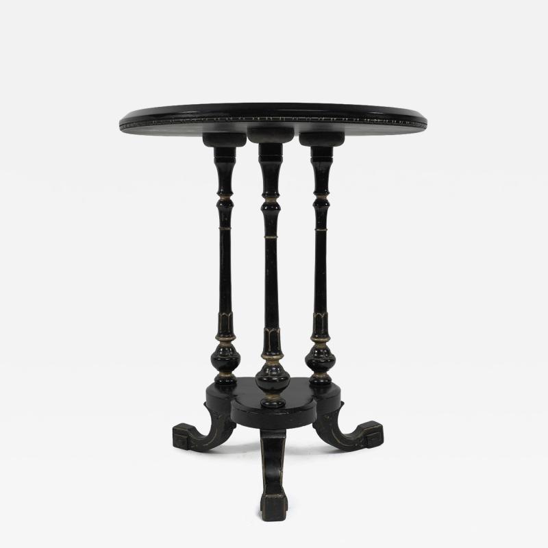  Gillows of Lancaster London Gillows of Lancaster An Aesthetic Movement ebonized circular side table