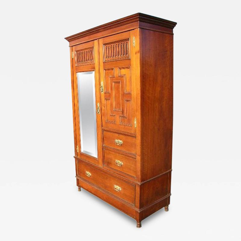  Gillows of Lancaster London Gillows of Lancaster an Aesthetic Movement Walnut Armoire Wardrobe Compactum