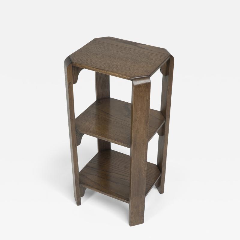 Heal s Heals Heal Son Ltd Heals of London attributed A late oak three tier book table or wotnot