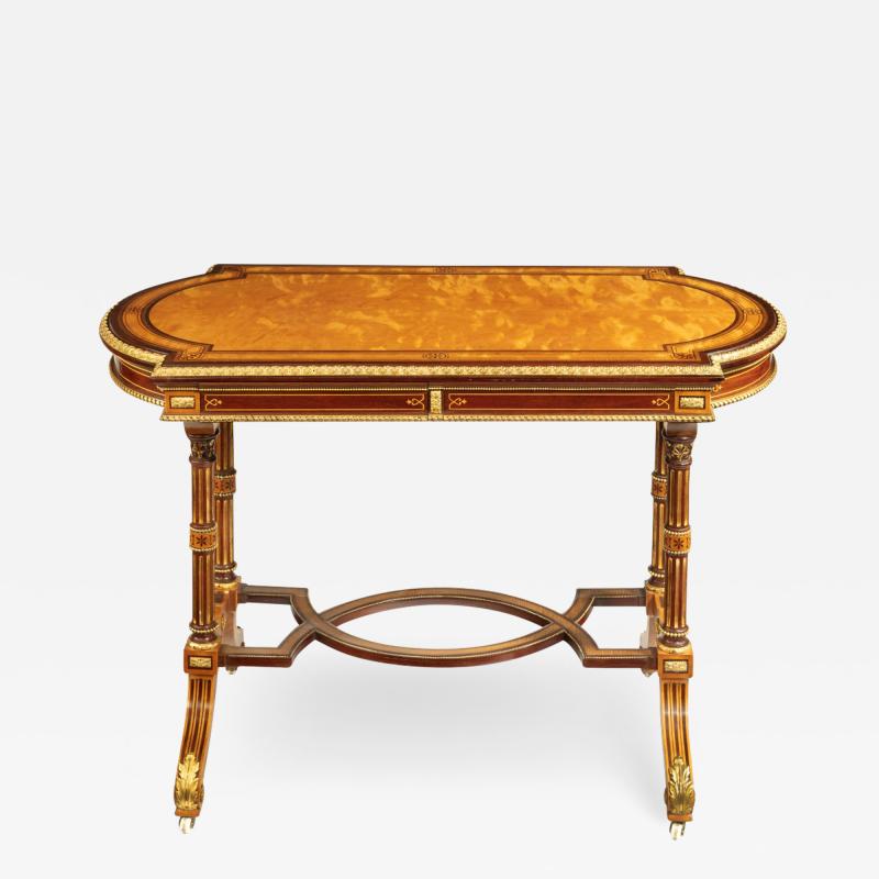  Holland Sons A Victorian fine satinwood ladies writing table attributed to Holland and Sons