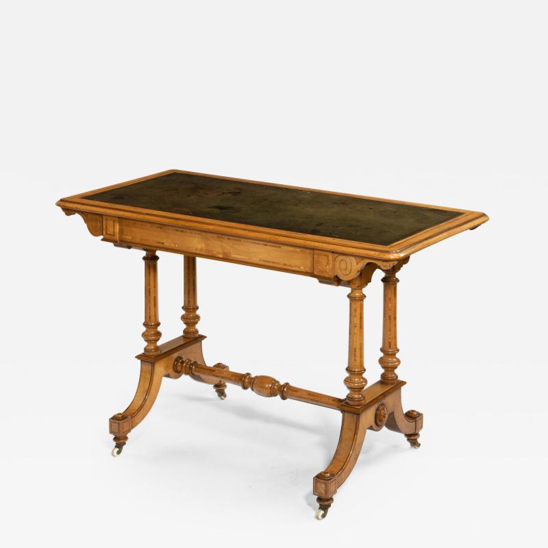  Holland Sons A Victorian writing table attributed to Holland and Sons
