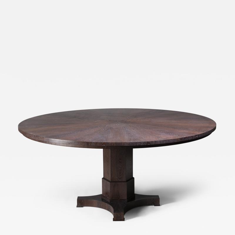  ILIAD DESIGN A pedestal dining table by ILIAD Design