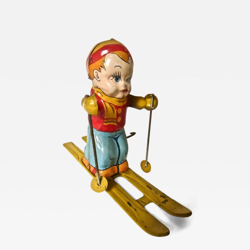  J Chein Co Vintage Tin Wind Up Toy Boy Skier by J Chein Co American Circa 1950