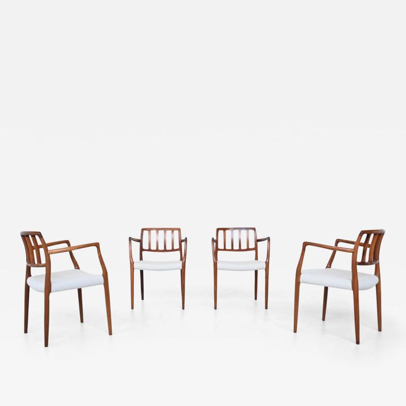  J L Mollers Mobelfabrik Niels Otto Moller armchairs 66 in rosewood and boucl Denmark 1974