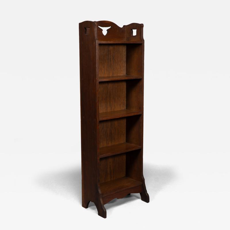  Liberty Co Liberty Co A Slim Arts Crafts Oak Bookcase with Stylized Floral Cut outs