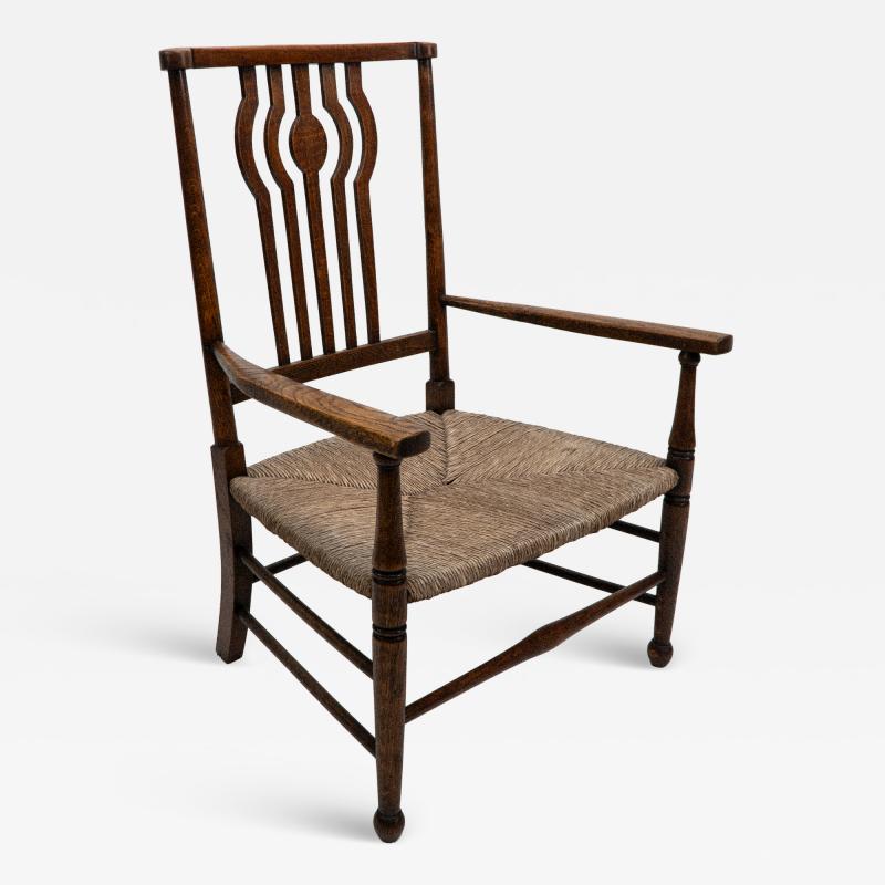  Liberty Co Liberty Co An Arts Crafts Rush Seat Armchair