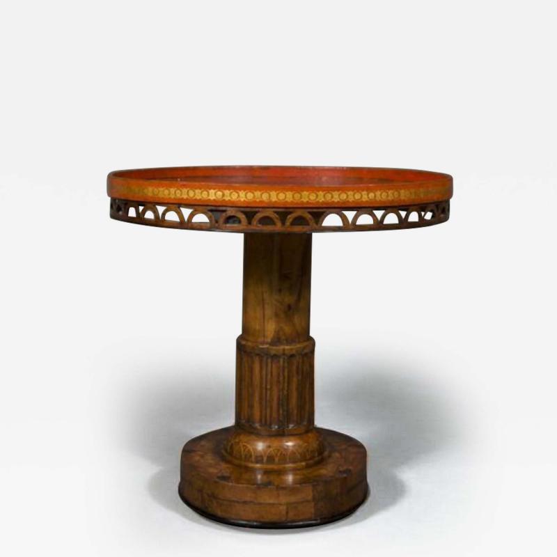  MICHEL GARNIER A RARE WALNUT AND BOXWOOD INLAID CIRCULAR CENTER TABLE