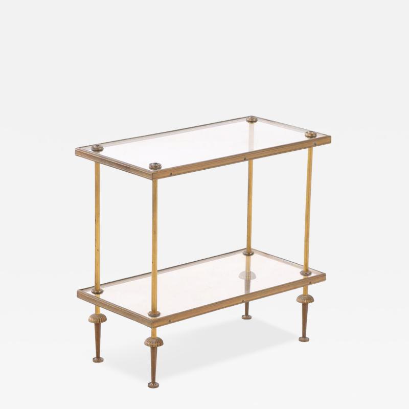  Maison Bagu s A French brass and glass tiered table in the manner of Bagues C 1950 