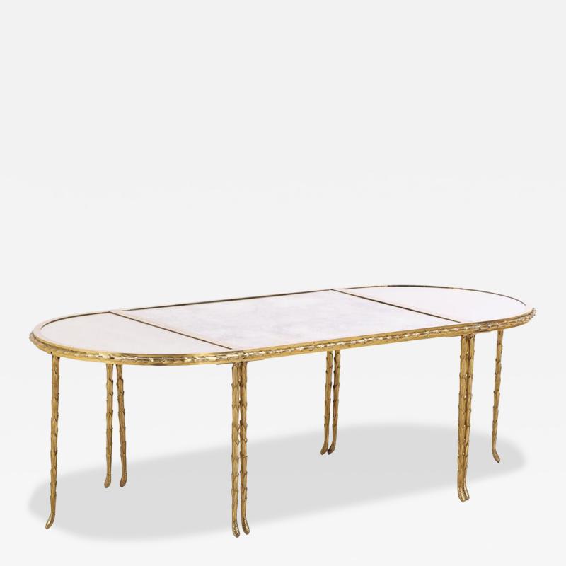  Maison Bagu s A French three part gilt bronze coffee table attributed to Bagues C 1960 