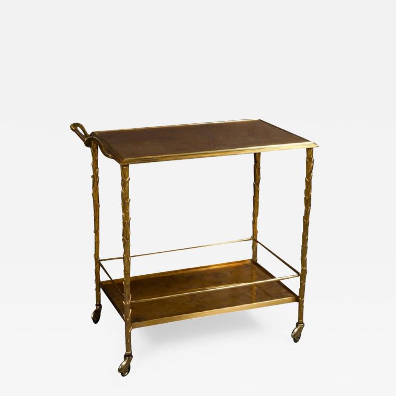  Maison Bagu s Gilt bronze Palm bar cart by Maison Bagues