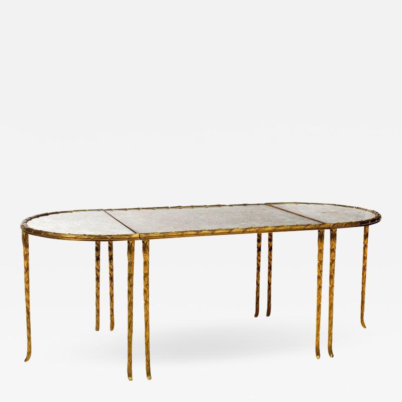  Maison Bagu s Gilt bronze eglomized glass top cocktail table by Maison Bagues