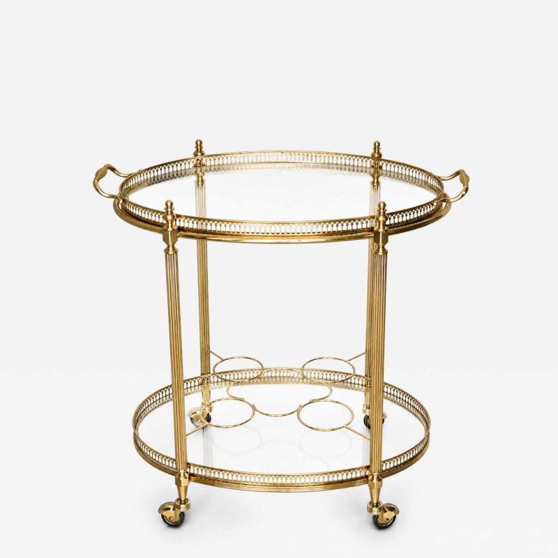  Maison Bagu s Mid century Maison Bagu s Brass Oval Bar Cart circa 1960