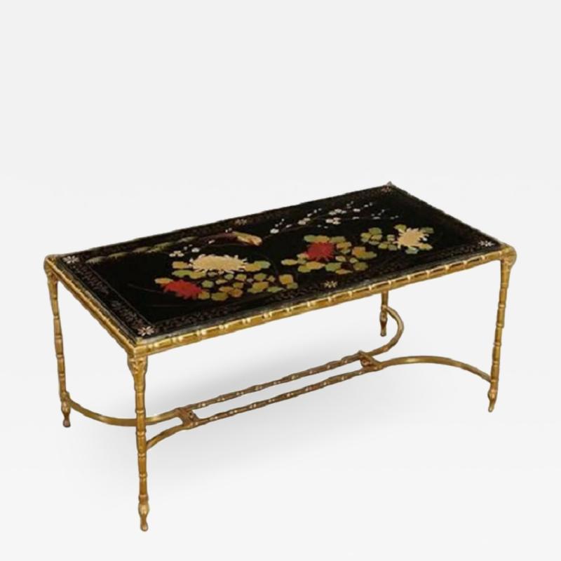  Maison Bagu s Rare gilt bronze faux bamboo coffee table by Maison Bagues with floral motifs 