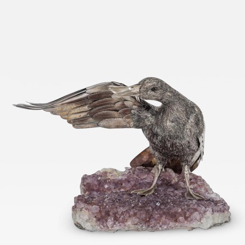  Mario Buccellati An Elegant Mario Buccellati Sterling Silver Duck Perched on an Amethyst Base