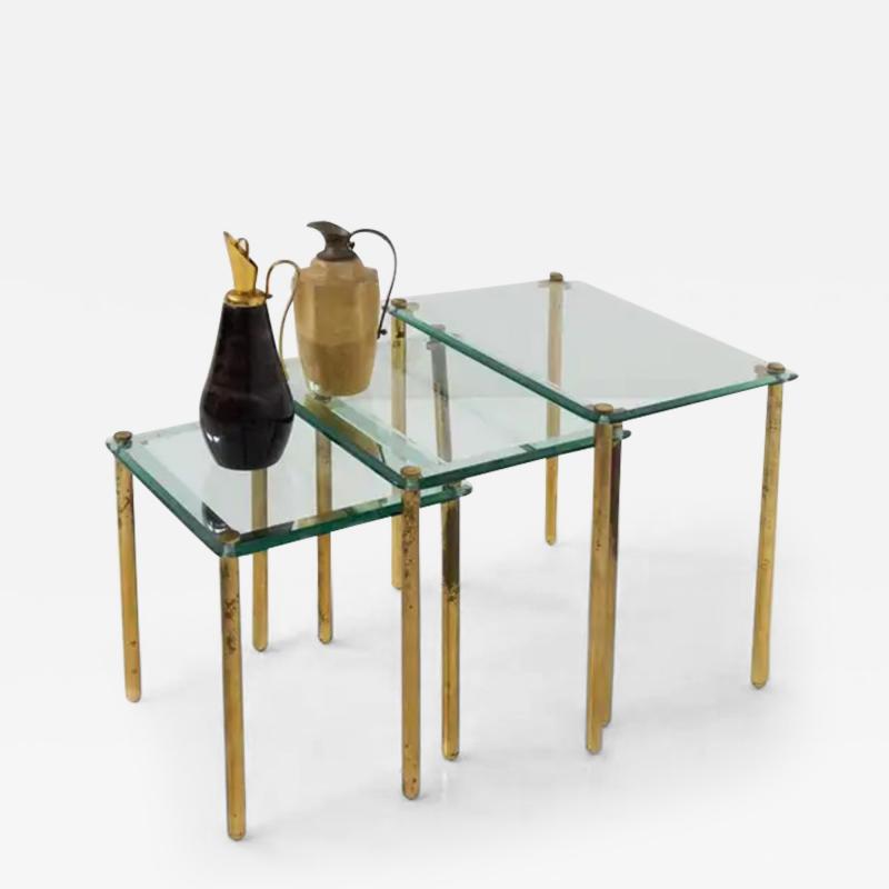  Midcentury Italian school Triptych of vintage Italian coffee tables in thick glass and brass