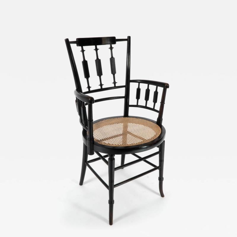  Morris Co Morris Co An Aesthetic Movement Cane Seated Armchair