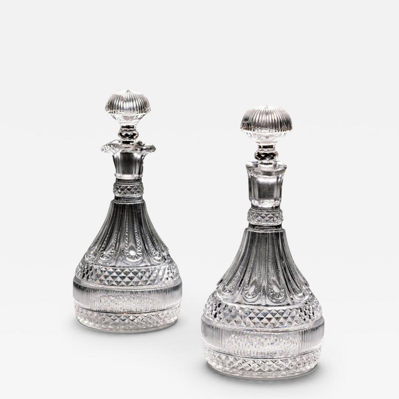  PERRIN GEDDES AN ELABORATELY CUT PAIR OF REGENCY SEMI SHIPS DECANTERS BY PERRIN GEDDES