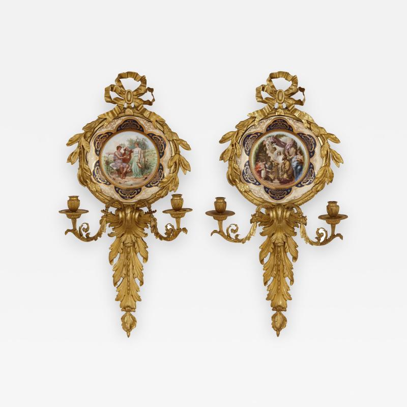  Pauly Co Pair of Italian porcelain and gilt bronze sconces by Pauly Co