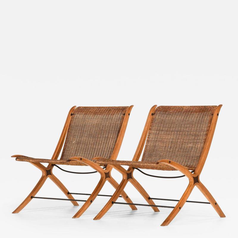 Peter Hvidt Orla M lgaard Nielsen Pair of Easy Chairs in Beech Rattan by Peter Hvidt Orla M lgaard Nielsen 1959