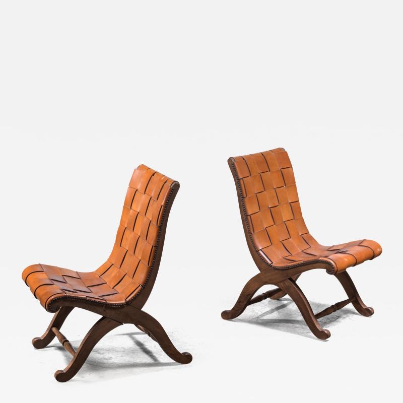  Pierre Lottier Pair of Pierre Lottier slipper chairs