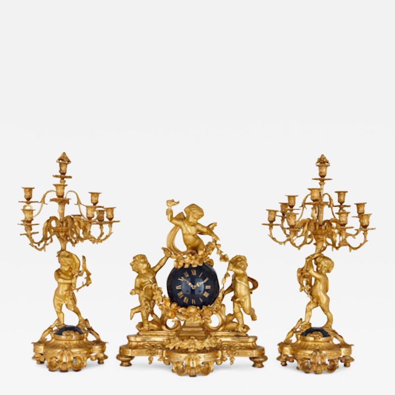  Popon A Paris Large cherub themed gilt bronze clock garniture by Popon