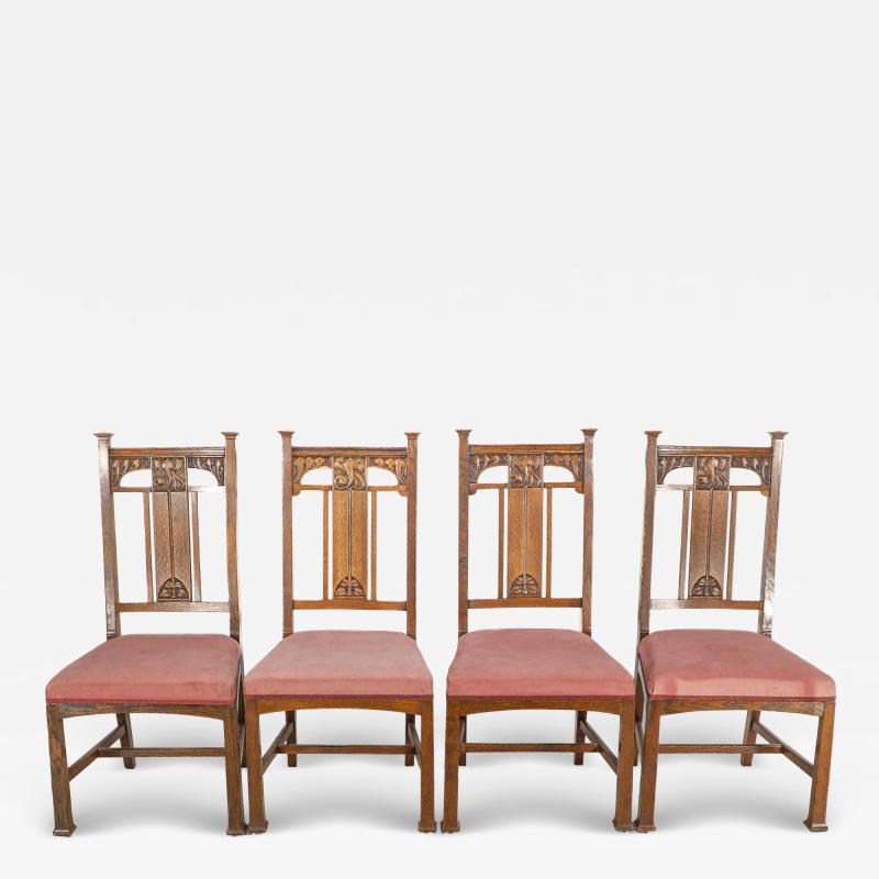  Robson Sons Robson Sons Set of 4 Arts Crafts oak dining chairs with carved floral backs