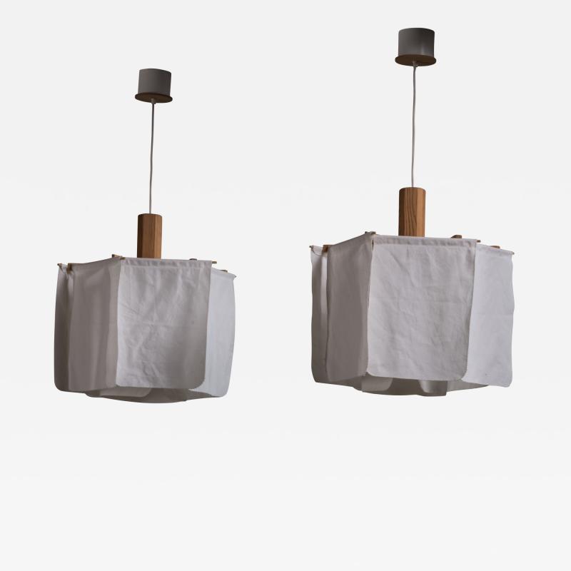  Robygge AB Pair of Erik Asmussen pine and fabric pendants