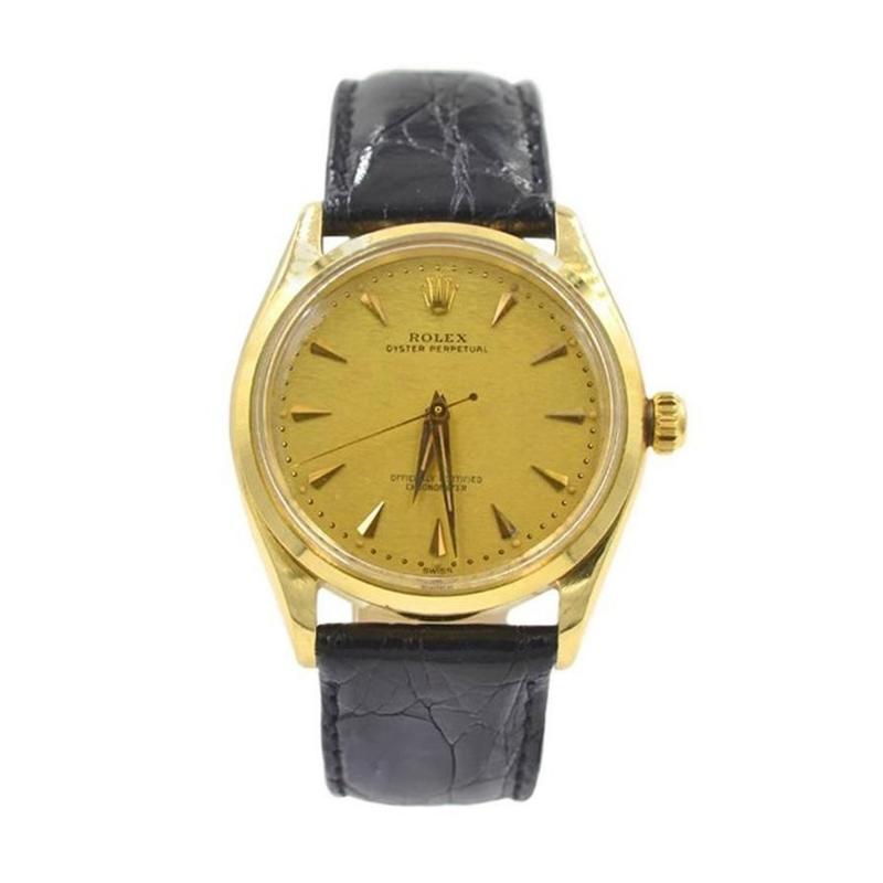  Rolex Watch Co ROLEX 14K YELLOW GOLD OYSTER PERPETUAL WRISTWATCH REF 6567 1959