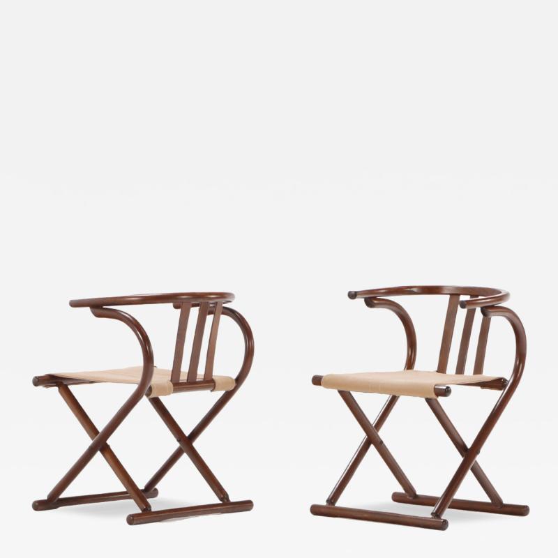  Thonet A pair of Thonet style folding sling chairs having downswept arms 