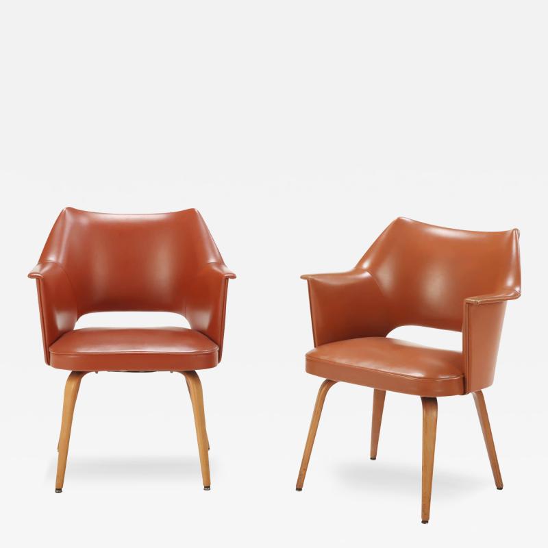  Thonet Pair of mid century modern labeled Thonet leather chairs having continuous arms