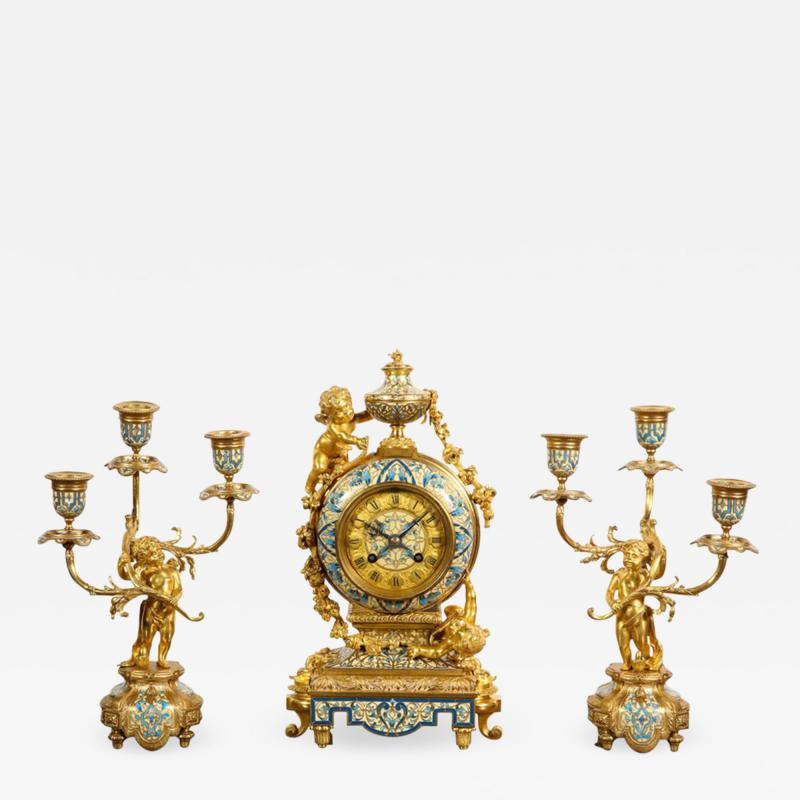  Tiffany and Co A French Gilt Bronze and Champleve Enamel Clock Set Retailed by Tiffany Co 