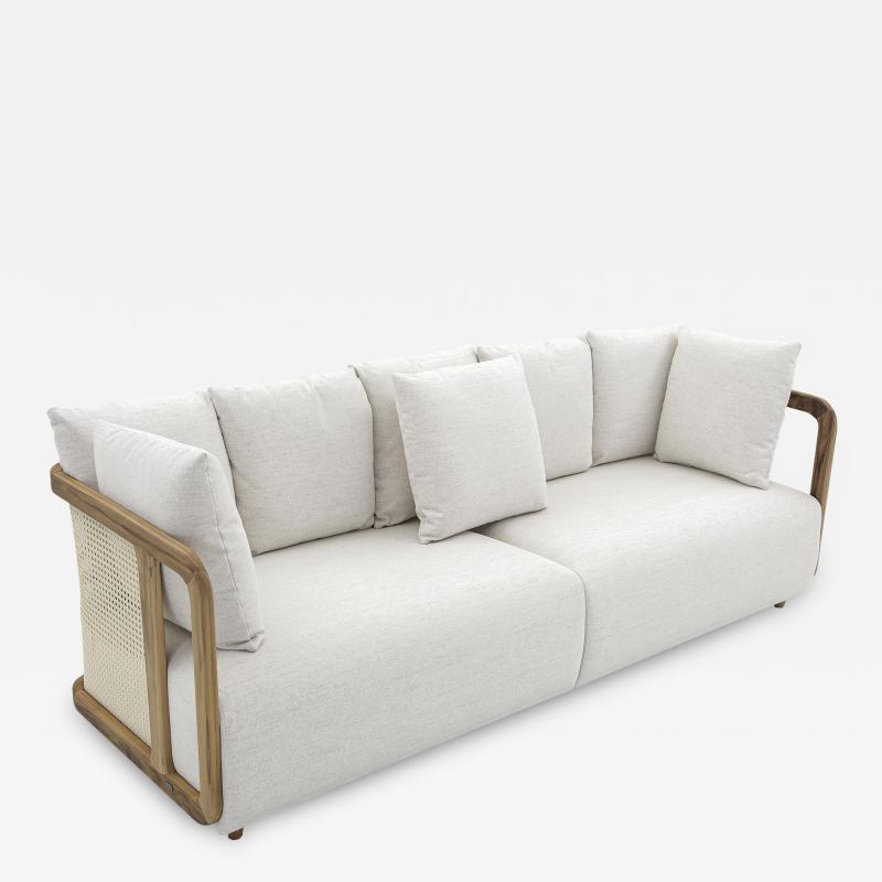 Uultis Design Aiby Sofa with a Teak Frame featuring Cane Siding