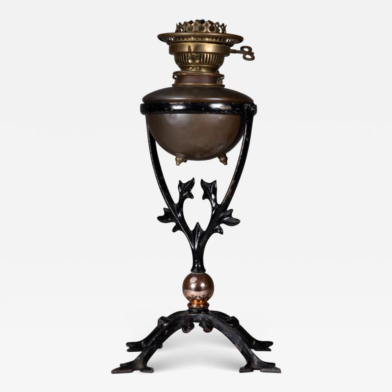  William Benson W A S Benson Co W A S Benson An Arts Crafts Cast Iron Four Leg Table Oil Lamp