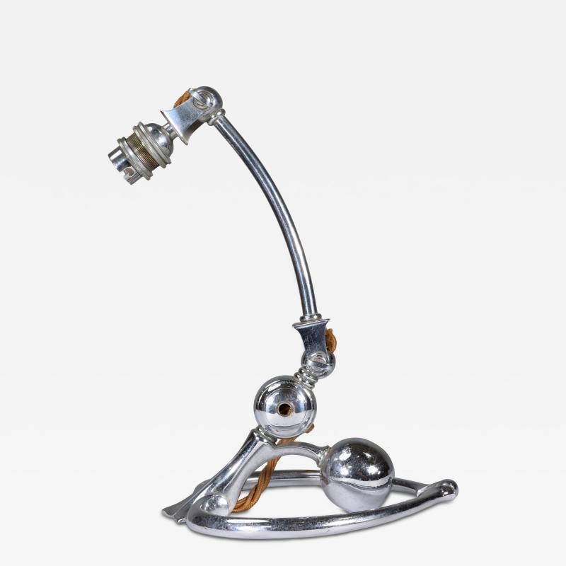  William Benson W A S Benson Co W A S Benson An Arts and Crafts chrome plated table lamp with heart shaped base