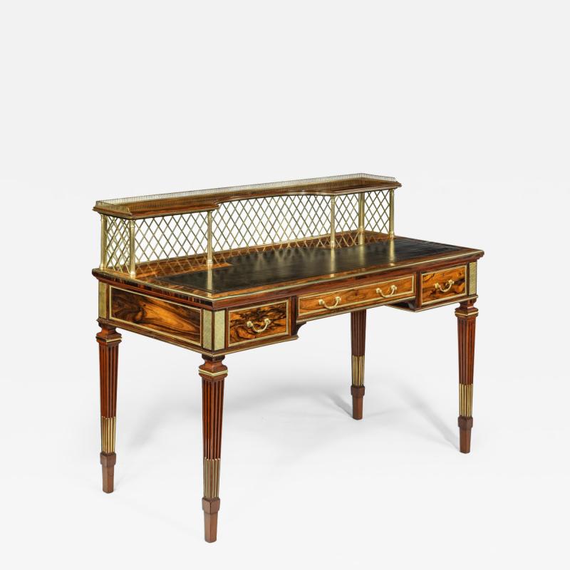  Wright and Mansfield An olivewood writing table by Wright and Mansfield