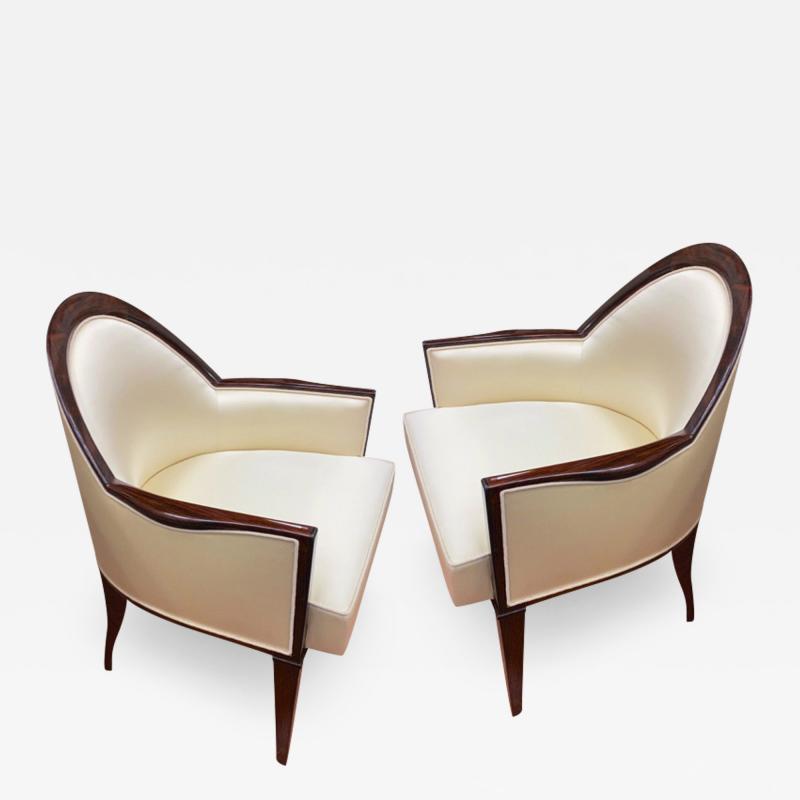  mile Jacques Ruhlmann J E Ruhlmann pair of refined solid Makassar arm chairs covered in satin silk